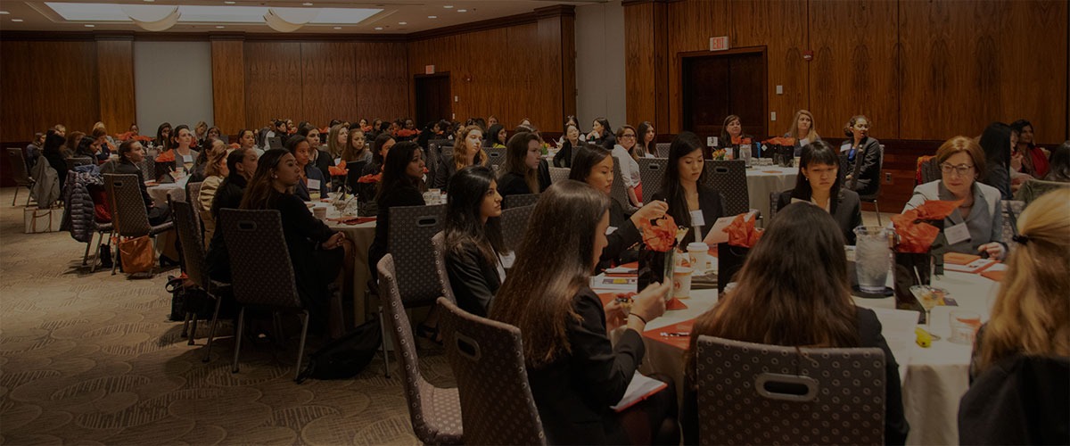 students and professionals attending a conference