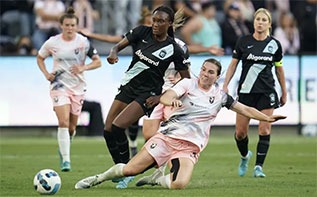 NJ/NY Gotham FC forward Ifeoma Onumonu, center left, and Angel City FC defender Vanessa Gilles battle for the ball during the second half of a 2022 NWSL soccer match in Los Angeles.